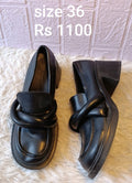 Black loafers