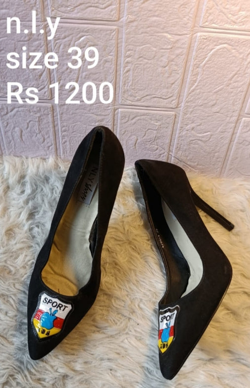 N L Y heels